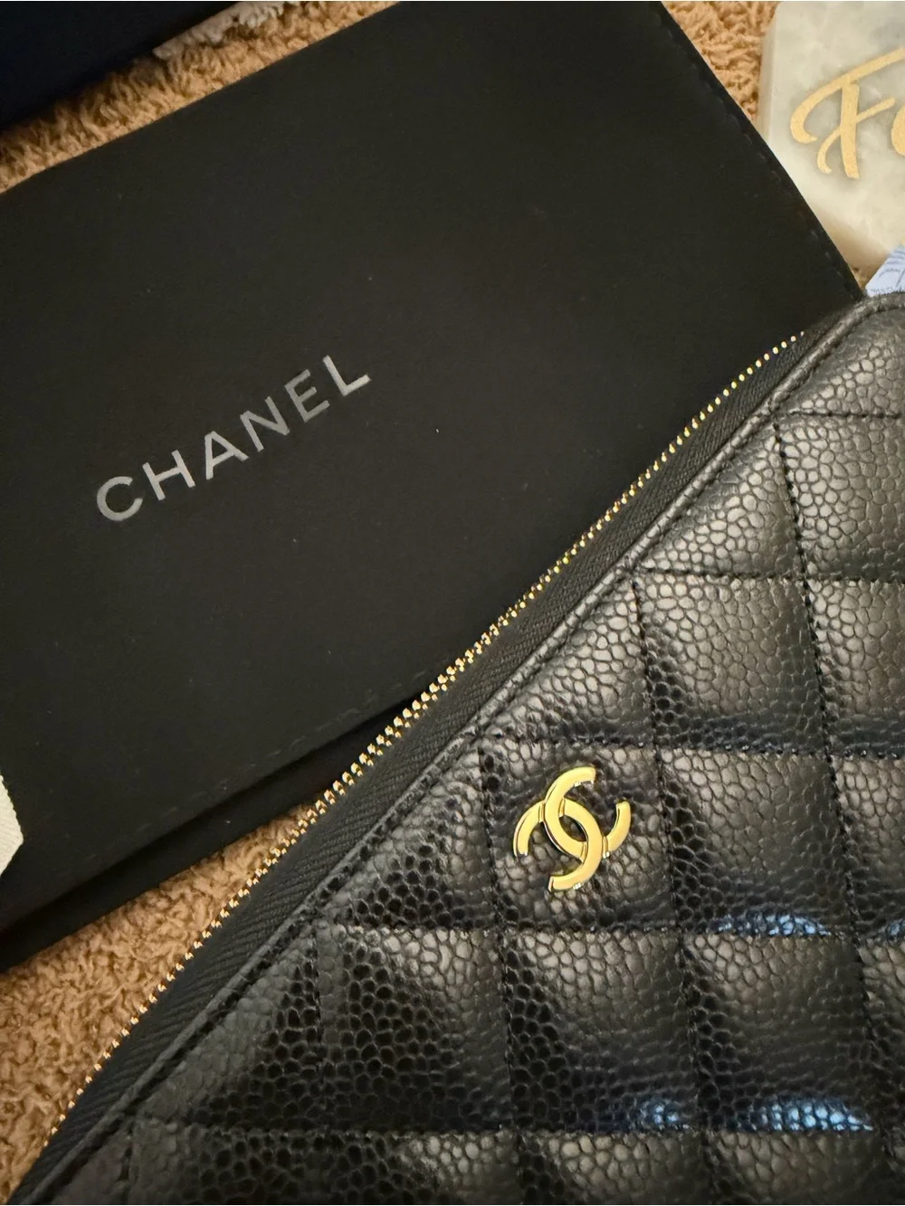 CHANEL Black Quilted Caviar Leather Zip Around Wallet with Gold CC